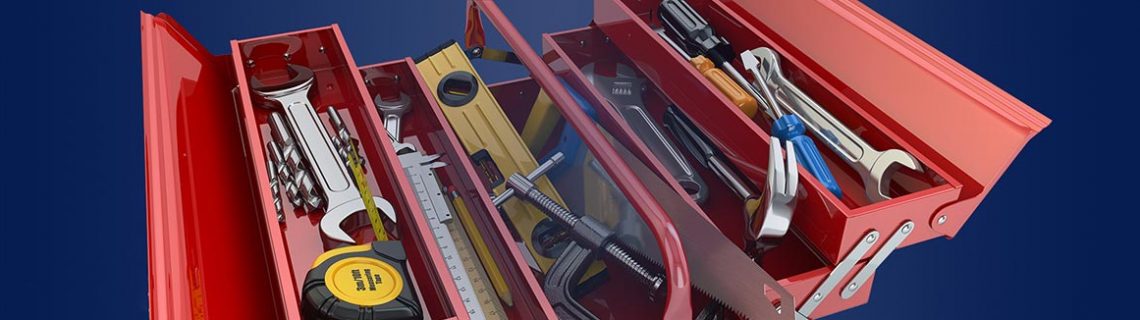Red toolbox filled with various tools