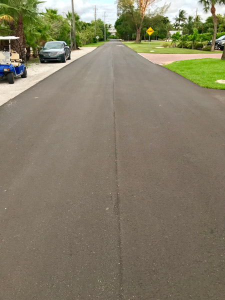 Inspect road pavement around 10 to 11 months within  typical warranty.